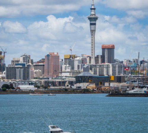 Auckland city skyline at city center and Auckland Sky Tower, the iconic landmark of Auckland, New Zealand.